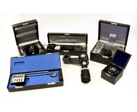 Wild Binocular Microscope together with various boxed accessories; together with two other microscopes: Zeiss binocular and O