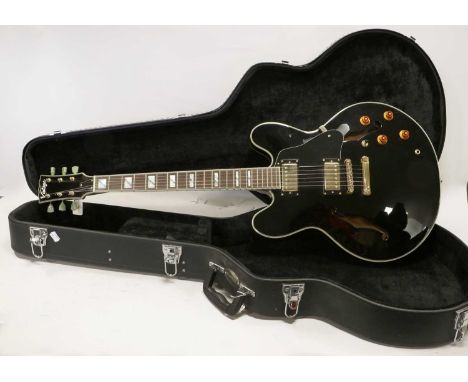 Vintage VSA 500 Archtop Guitar black finish with cream banding, four control dials, 3 way control switch, two pickups, black 