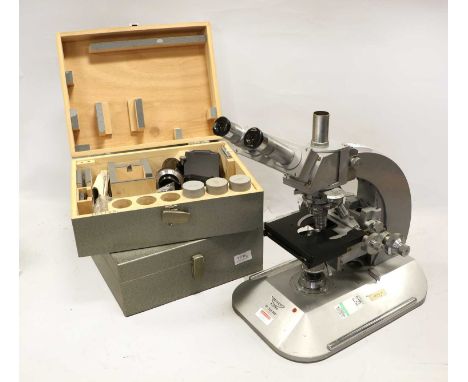 Reichert (Austria) Binocular Microscope with four lens turret and adjustable calibrated stage; together with two case of acce