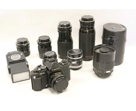 Canon F1 Camera with FD f1.8 50mm lens; Makinon f8 500 mirror, Tokina f2.8 24mm, Canon FD f3.5-4.5 35-70mm, Canon FD f5.6 100