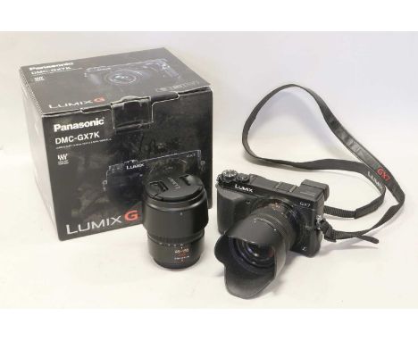 Lumix GX7 Camera with G Vario f3.5-5.6 14-42mm lens (boxed) and G Vario f4-5.6 45-150mm lensCamera untested, general wear fro