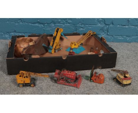 A collection of vintage die cast vehicles. Dinky coventry climax fork lift truck, Dinky elevator loader, Dinky goods yard cra