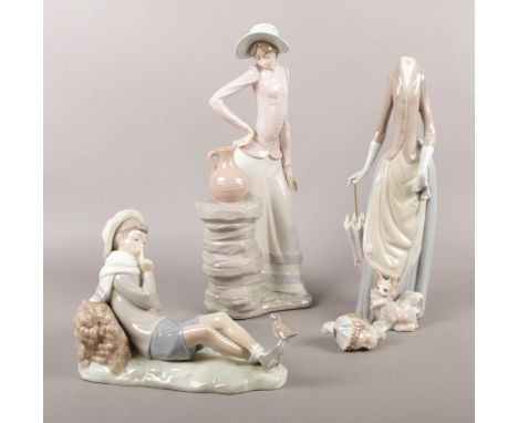 Three Lladro/Nao figures. (tallest 34cm)  damage to two of figures. head broken off &amp; head broken off other been glued.