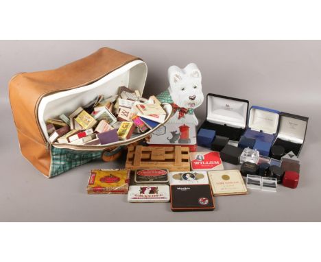 A very large quantity of matchboxes, together with vintage tins and jewellery boxes.  