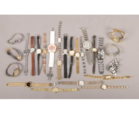 A large quantity of ladies quartz wristwatches. To include examples from Seiko, Timex and Givenchy.  