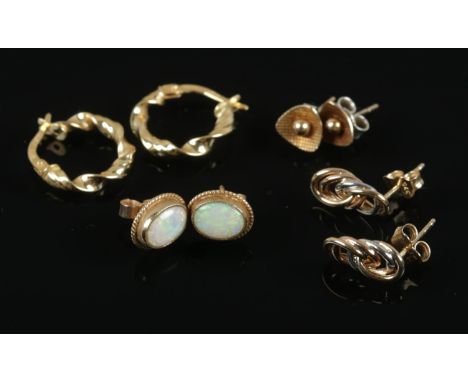 Four pairs of gold earrings. Including pair of 9ct gold opal earrings, 18ct gold loop examples, etc. 4.27g  