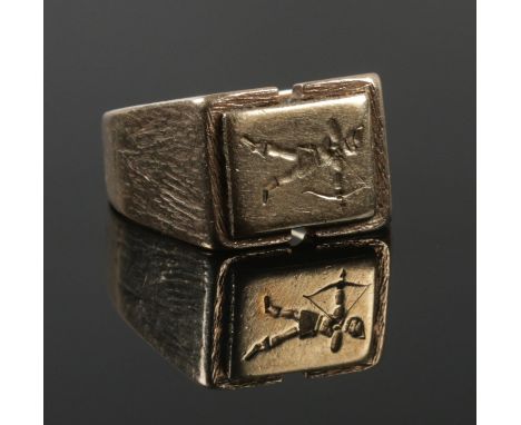 A 9ct gold seal ring with panel depicting Robin Hood. Size S 1/2. 15.57g.  