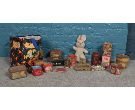 A bag of assorted vintage tins and a musical teddy bear. To include OXO, Jacksons of Piccadilly, After Eight and Elastoplast 