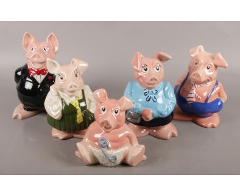Five ceramic NatWest pigs.  