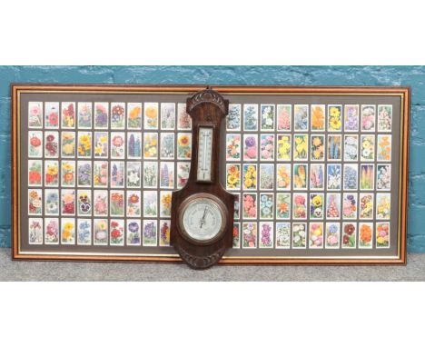 Two framed Wills cigarette card collections, Garden Flowers, along with a banjo barometer.  