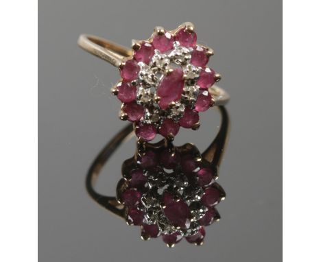 A 9ct gold Ruby &amp; diamond Marquise ring. Size N. Total weight 2.44g.  