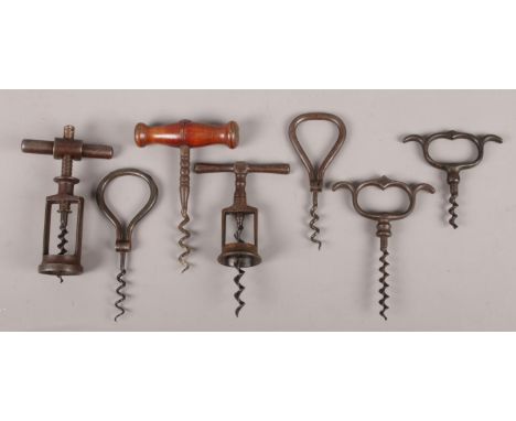Seven vintage corkscrews. To include a "The Surprise" corkscrew and a wooden turned handle design etc.  
