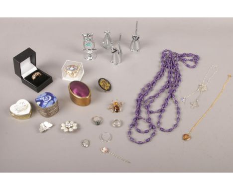 A collection of mostly costume jewellery. Brooches, beads, trinkets etc. To include a silver ring &amp; a ring stamped 9ct.  