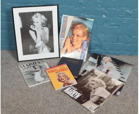 A collection of Marilyn Monroe memorabilia. Roger G Taylor Marilyn on Marilyn book, Andre de Dienes Marilyn Mon Amour book, f