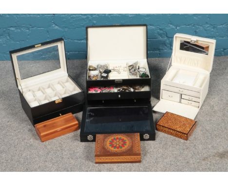 A quantity of jewellery boxes. Includes watch box and ring cabinet, along with a small quantity of costume jewellery.  