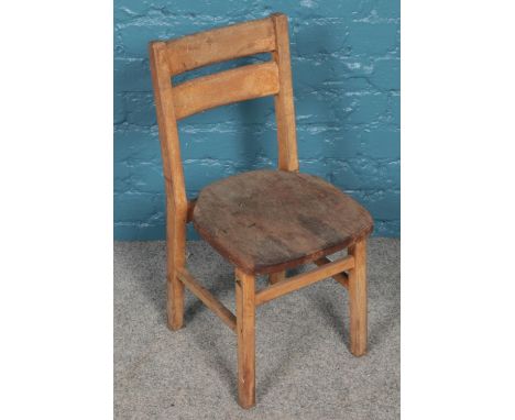 A vintage beech child's chair.  