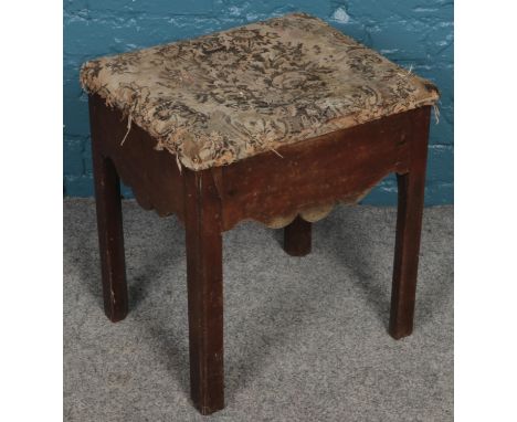 A Georgian mahogany upholstered stool/commode.  