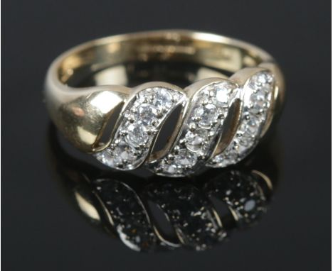 A 9ct gold and three band Cubic Zirconia ring. Size O½. Total weight: 2.82g  