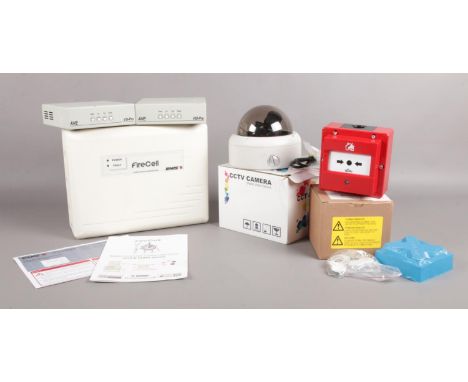 An alarm/fire system and boxed CCTV Camera. To include a Firecell Radio Cluster Communicator and waterproof manual call point