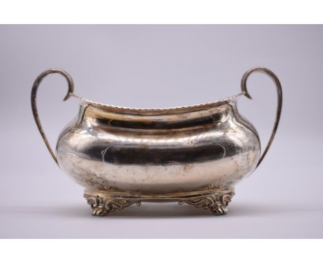 A silver twin handled sugar basin, by Atkin Brothers, Sheffield 1923, 10cm high, 281g. 