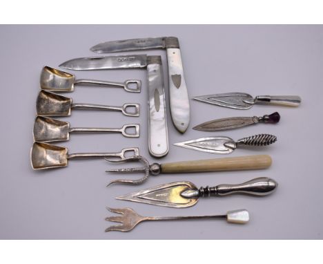 A small collection of silver and mother of pearl mounted items, comprising: four bookmarks; two silver &amp; mother of pearl 