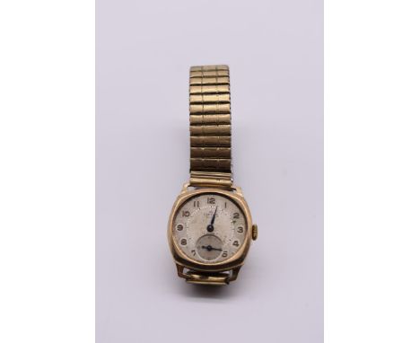 A vintage Smiths 'Deluxe' 9ct gold manual wind wristwatch, on later plated expanding bracelet. 