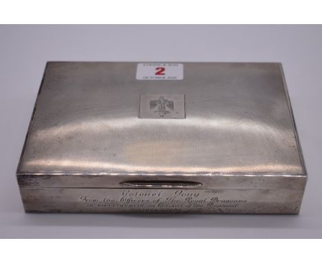 An engine turned silver cigarette box, by&nbsp;Padgett &amp; Braham Ltd,&nbsp;London 1963, having Royal Dragoon crest, 16 x 1