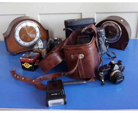 Olympus OM-1 SLR camera with lenses case and accessories, Olympus XA1, also Zenith bincoluars and two mantel clocks. Conditio