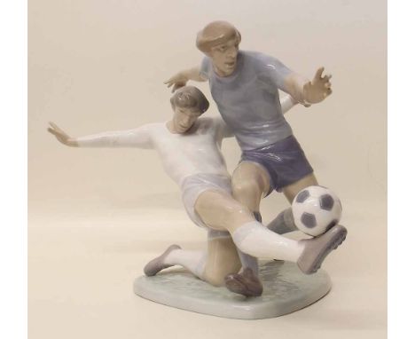 Lladro footballers figure group. Condition report: see terms and conditions'.
