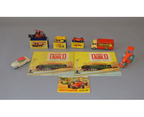 Three boxed Matchbox models: #18 Caterpillar Bulldozer; #73 Ferrari Racing Car; Y-4 Horse Drawn Fire Engine. Together with th