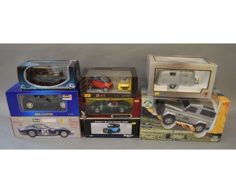 Eight assorted large scale diecast models, includes: two Revell 1:12 models; Maisto; Ricko; etc. Overall appear E, boxed. (8)