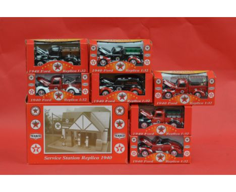 Texaco Old Timer Collection Service Station Replica 1940, together with six diecast vehicles. All boxed, overall appear E. (7