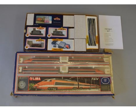 OO Gauge. 2 x train sets. Bachmann diesel freight 04 class shunter BR black with 2 rolling stock track & Lima TGV high speed 