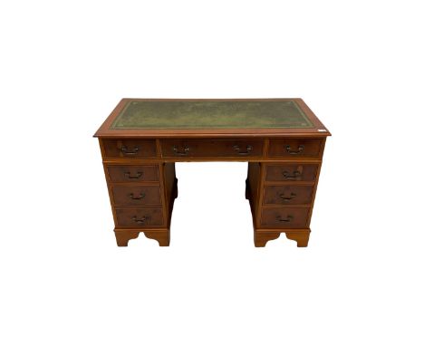 Yew wood twin pedestal office desk, fitted with nine drawersDimensions: Height:&nbsp;79cm&nbsp; Length/Width:&nbsp;122cm&nbsp