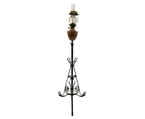 Late 19th century black painted wrought metal standard lamp, telescopic column, copper reservoir