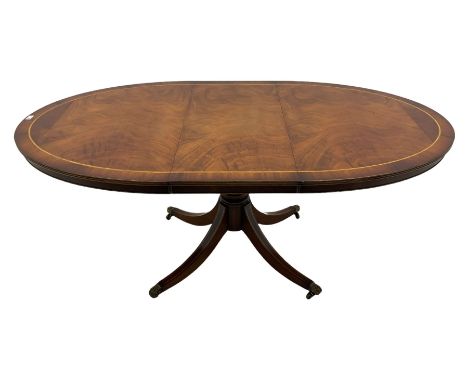 Georgian design oval mahogany extending dining table, with extra leaf, single pedestal base, inlaid detailDimensions: Height: