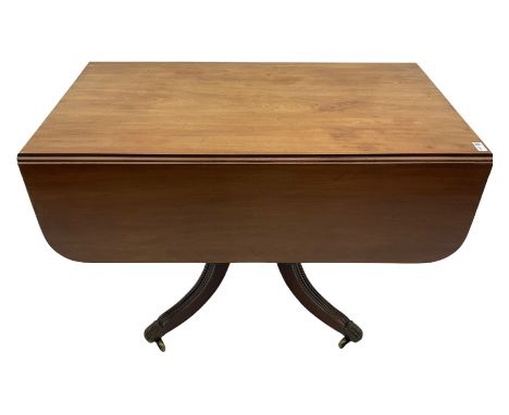 George III mahogany supper table, rounded rectangular drop leaf top with drawer to each end, on turned column with four out s