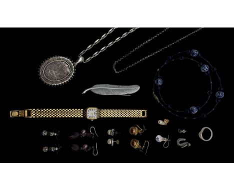 Victorian silver locket on a modern silver chain, pair of gold simulated pearl earrings and a collection of costume jewellery