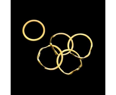 9ct gold puzzle ring and a 14ct gold bandCondition Report:9ct approx 5 grams, 14 ct approx 2.1