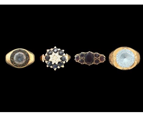 Three  9ct gold stone set rings, including single stone cubic zirconia ring and a garnet cluster ring, and a 14ct gold stone 