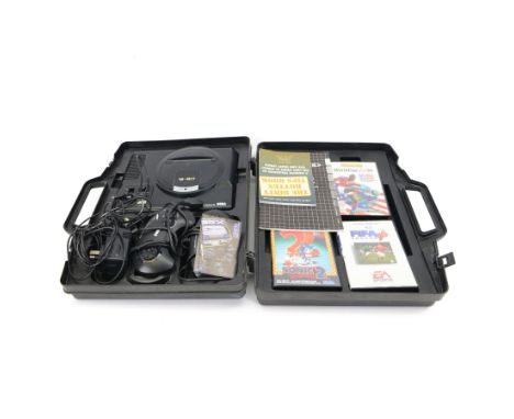 16-Bit Sega Mega Drive console with two controllers and four games, comprising Fifa 96, Sonic The Hedgehog 2, Sonic The Hedge