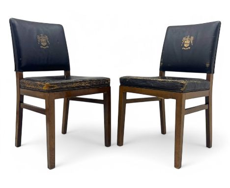 Pair of mid-20th century hardwood chairs associated with the Company of Cutlers in Hallamshire, Sheffield, each featuring a s