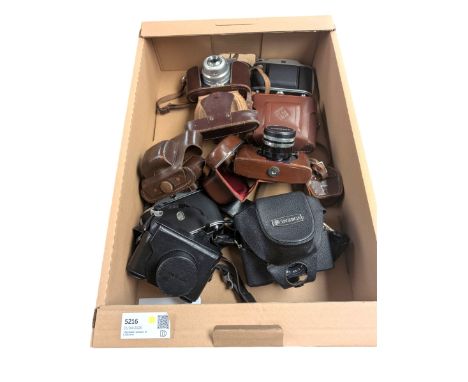 Eight vintage cameras, including Yashica MG-1, Yashica Lynx 1000, Koroll 24 S, Paxette and Fujifilm X10
