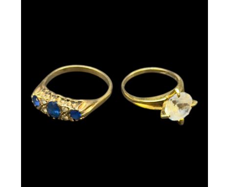 Two 9ct gold paste rings, one hallmarkedCondition Report:Approx 8.6 grams, blue stone ring tests 9ct on shank and 14ct on gal