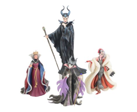 Disney Showcase Haute Couture figures, comprising Evil Queen, Cruella Devil and two Malificent, all boxed
