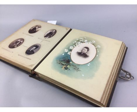 EARLY 20TH CENTURY ALBUM OF POSTCARD PHOTOGRAPHS, enclosing various portrait photographs