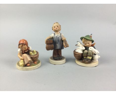 HUMMEL FIGURE OF A GIRL HOLDING A BASKET, 14cm high, along with four other Hummel figures (5)