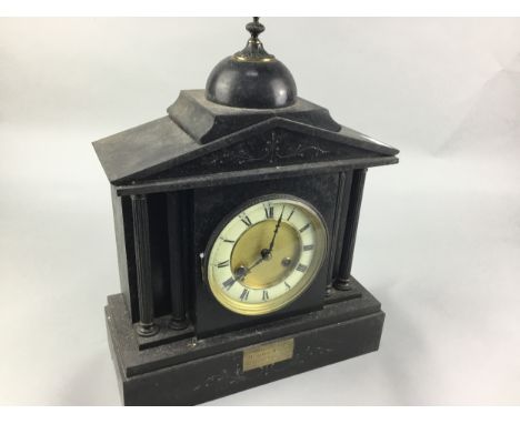 BLACK SLATE MANTEL CLOCK, with domed top, 41cm high, with presentation inscription dated 1906