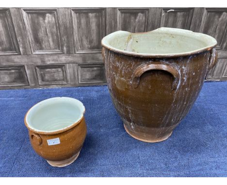 TWIN HANDLED PLANTER, 22cm high, along with a similar larger planter (2)