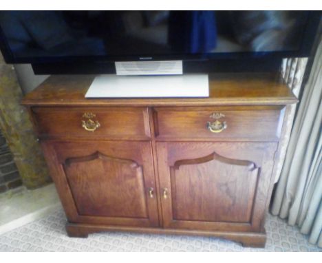 Oak Two Door Two Drawer Cabinet On Bracket Base Glass Distressed Mirrored Top Internally Fitted With Mini Bar 121 x 60 x 61cm